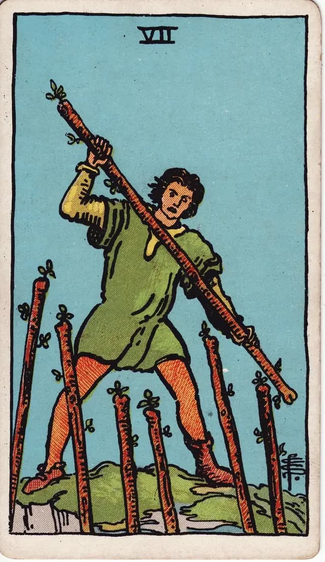 ภาพไพ่ Seven of Wands (7 ไม้เท้า) จากสำรับ Rider–Waite–Smith